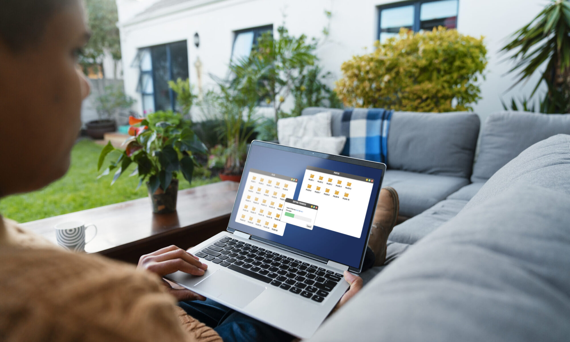 Person using a rented laptop securely while working remotely with data privacy protection
